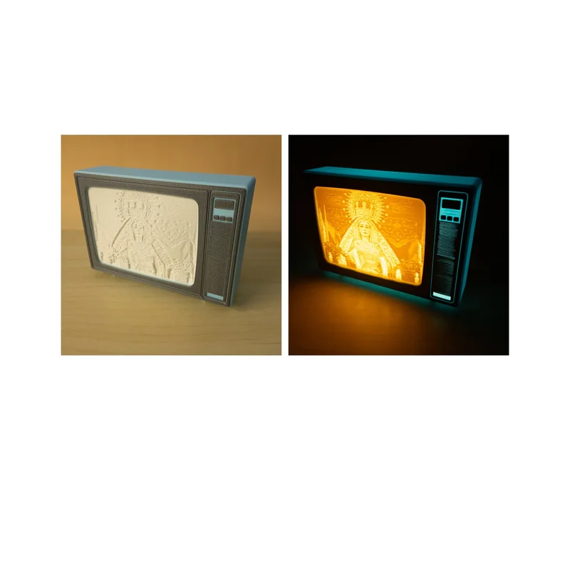 The same blue retro TV with a graphite front, twice: on the left switched off on a wooden table, with a devotional image in white relief on the screen; on the right switched on in the dark, with the same image in amber tones and the case glowing